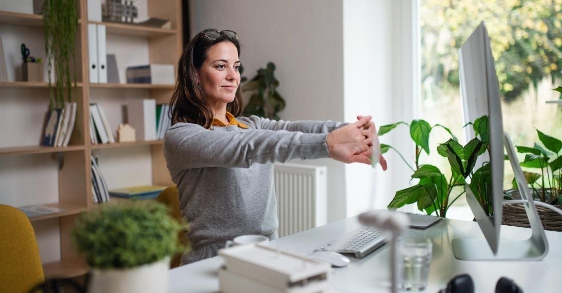 A woman working on computer at home