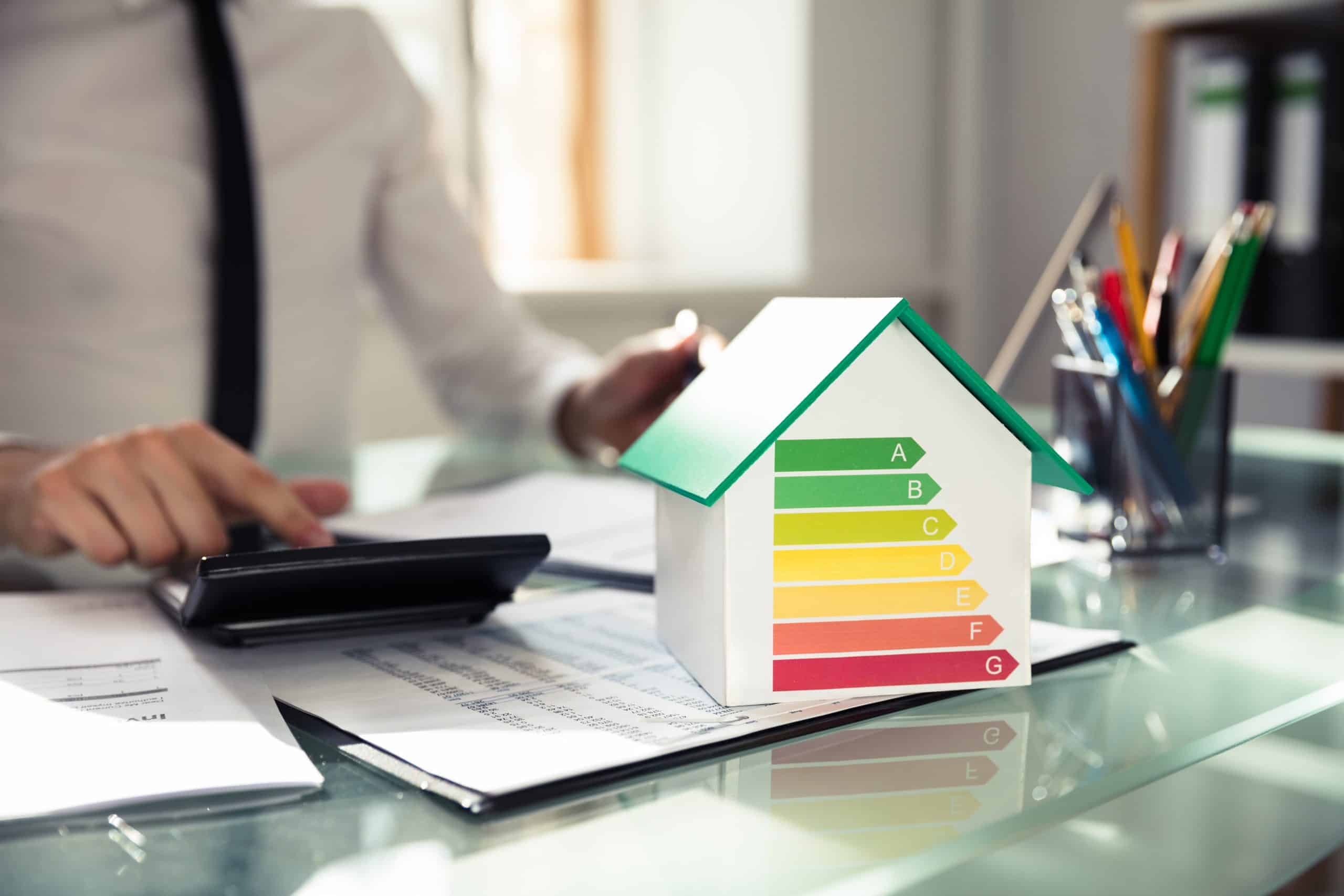 A man conducting home energy audit in summer